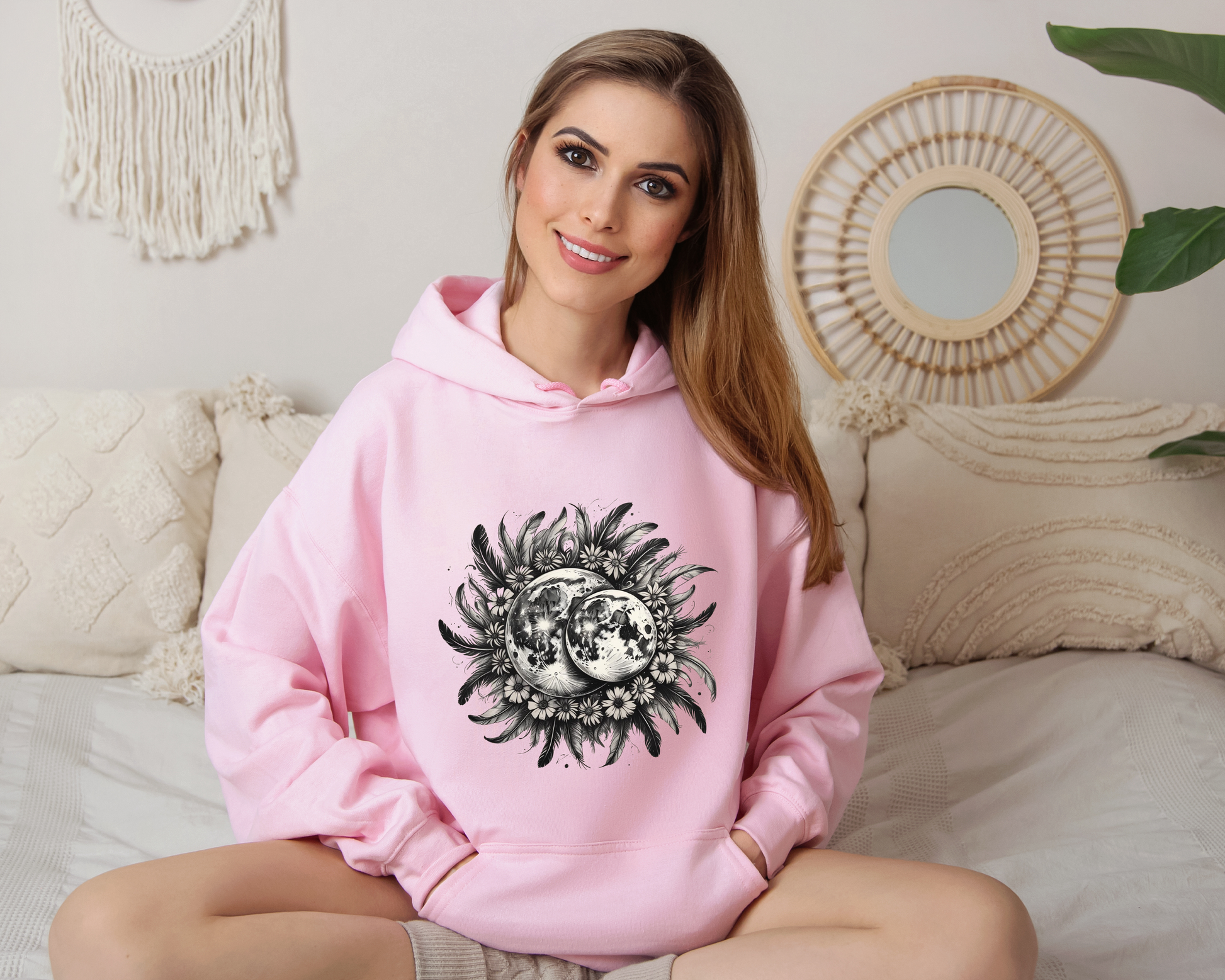 Celebrate the mystery of the night sky with the Twin Moons Hoodie, featuring two radiant moons embraced by a halo of feathers and wildflowers. This enchanting design blends celestial beauty with natural elegance, creating the perfect statement piece for dreamers, stargazers, and lovers of mystical fashion.
Soft, cozy, and effortlessly stylish, this hoodie is ideal for moonlit walks, cozy nights under the stars, or simply carrying a little magic with you wherever you go.
- A must-have for fantasy lovers, c